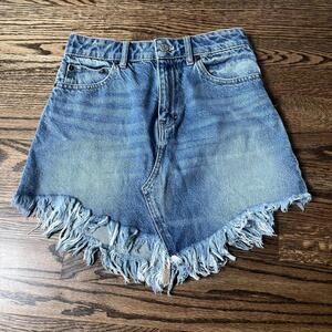 High-waisted trashed raw hem frayed denim jean Free People mini skirt